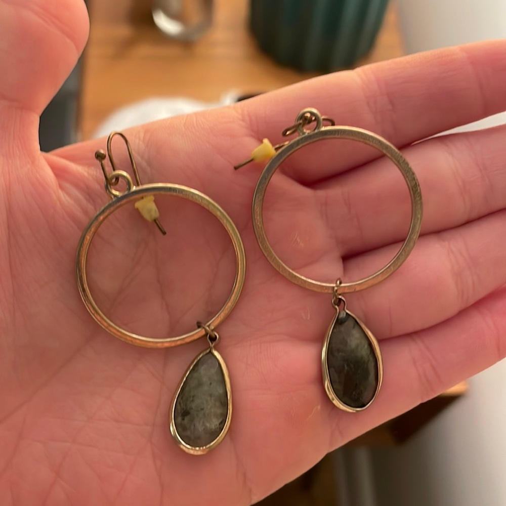 Gold earrings with green stone